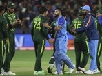 India's Virat Kohli shakes hands with Pakistan's Mohammad Wasim following the T20 World Cup cricket match between India and Pakistan in Melbourne, Australia, Sunday, Oct. 23, 2022. (AP Photo/Asanka Brendon Ratnayake) India's Virat Kohli shakes hands with Pakistan's Mohammad Wasim following the T20 World Cup cricket match between India and Pakistan in Melbourne, Australia, Sunday, Oct. 23, 2022. (AP Photo/Asanka Brendon Ratnayake)