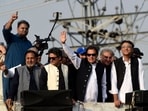 Former Pakistan prime minister Imran Khan gestures during an anti-government long march towards Islamabad to demand early elections, in Lahore, on Friday. Former Pakistan prime minister Imran Khan gestures during an anti-government long march towards Islamabad to demand early elections, in Lahore, on Friday.