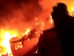In a video tweeted by news agency ANI, the area was seen engulfed in flames with houses that had reduced to wrecks fuelling the fire. (ANI videograb) In a video tweeted by news agency ANI, the area was seen engulfed in flames with houses that had reduced to wrecks fuelling the fire. (ANI videograb)