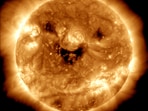 The three dark patches that made the Sun ‘smiling’ are coronal holes- regions of open magnetic field line structures allowing solar wind to readily escape into space.(@NASASun/ Twitter)
