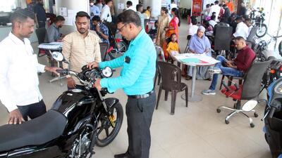 People buy vehicles at a showroom in Chinchwad. (HT PHOTO) People buy vehicles at a showroom in Chinchwad. (HT PHOTO)