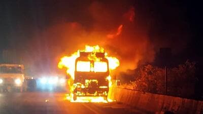 A moving truck on its way to Mumbai caught fire on the Mumbai-Pune Expressway on Thursday night. (HT)