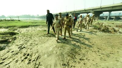 ACP Ashutosh Dwivedi and Noida police officers survey the Yamuna bank at Okhla Barrage where a special Chhath Ghat will be built. (Sunil Ghosh/HT Photo) ACP Ashutosh Dwivedi and Noida police officers survey the Yamuna bank at Okhla Barrage where a special Chhath Ghat will be built. (Sunil Ghosh/HT Photo)