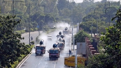 Mobile anti-smog guns spray water on the roads after flag-off by Delhi Environment Minister Gopal Rai to control air pollution. (ANI file) Mobile anti-smog guns spray water on the roads after flag-off by Delhi Environment Minister Gopal Rai to control air pollution. (ANI file)