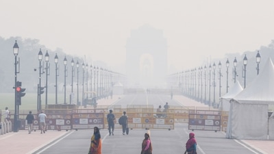 A thick layer of smog covers Kartavya Path in the morning, in New Delhi on Friday. (ANI Photo) 