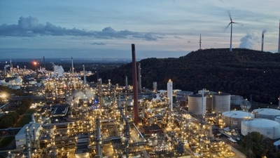 FILE - Wind turbines turn on top of a dump next to the 'BP Refinery Scholven' in Gelsenkirchen, Germany, (AP) FILE - Wind turbines turn on top of a dump next to the 'BP Refinery Scholven' in Gelsenkirchen, Germany, (AP)