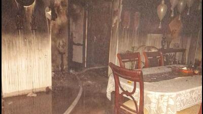 Police said the incident took place around 3am when LED lights hung around the apartment and balcony short-circuited and sparked a fire which engulfed the entire house within an hour. (HT Photo) Police said the incident took place around 3am when LED lights hung around the apartment and balcony short-circuited and sparked a fire which engulfed the entire house within an hour. (HT Photo)