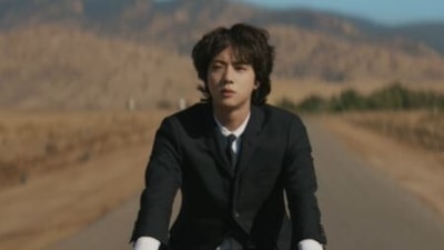 BTS member Jin in a still from The Astronaut.