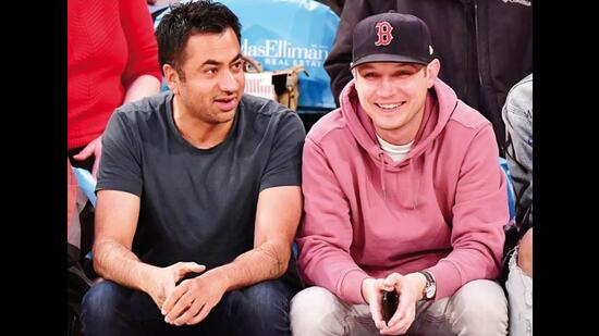 With his fiancé Josh at a basketball game (nstagram/@kalpenn) With his fiancé Josh at a basketball game (nstagram/@kalpenn)