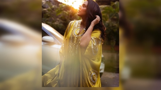 Neha Dhupia twirls and flaunts her stunning yellow kaftan.(Instagram/@nehadhupia)