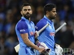 India's Virat Kohli, left, and teammate Suryakumar Yadav walk from the field at the end of their innings(AP) India's Virat Kohli, left, and teammate Suryakumar Yadav walk from the field at the end of their innings(AP)