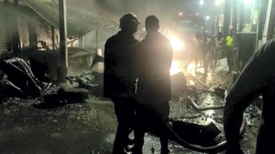 Security personnel at the site after an LPG cylinder exploded inside a car in Coimbatore. (PTI)