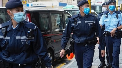 Hong Kong: Hong Kong Police officers are seen. (AP Representational) Hong Kong: Hong Kong Police officers are seen. (AP Representational)