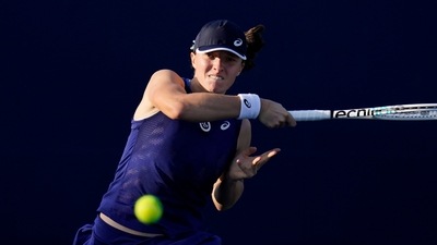 Iga Swiatek, of Poland, returns to Donna Vekic, of Croatia, during the final match at the San Diego Open tennis tournament (AP) Iga Swiatek, of Poland, returns to Donna Vekic, of Croatia, during the final match at the San Diego Open tennis tournament (AP)
