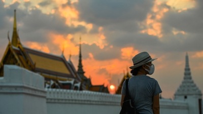 Thailand: A tourist wears a face mask to prevent spread of the coronavirus disease (Covid-19) in Bangkok, Thailand. (Reuters)