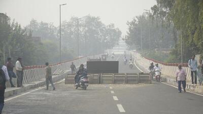 Ghaziabad, India – October 28, 2022: A barrier installed at the Dhobi Ghat bridge only permits two-wheelers to pass through, in Ghaziabad, India, on Friday, October 28, 2022. (Photo by Sakib Ali/ Hindustan Times). Ghaziabad, India – October 28, 2022: A barrier installed at the Dhobi Ghat bridge only permits two-wheelers to pass through, in Ghaziabad, India, on Friday, October 28, 2022. (Photo by Sakib Ali/ Hindustan Times).