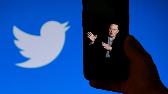 Elon Musk Twitter Takeover: A phone screen displays a photo of Elon Musk with the Twitter logo.(AFP)