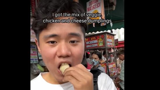 Korean food blogger tries momos.(YouTube/@Inwook)