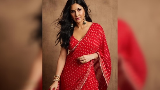 Katrina Kaif recently blessed our Instagram feed with stunning photos of herself in a red saree which she paired with a matching blouse featuring a plunging neckline.(Instagram/@katrinakaif)