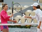 Iga Swiatek (in white) with Simona Halep(Getty/File Photo) Iga Swiatek (in white) with Simona Halep(Getty/File Photo)