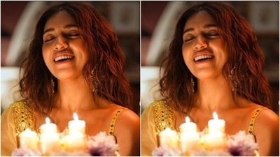 Bhumi looked stunning as ever in a sleeveless yellow blouse with a plunging neckline, teamed with a bright yellow long flowy skirt embellished in silver mirror work details. The yellow silk dupatta added more festive vibes to her look. (Instagram/@bhumipednekar) Bhumi looked stunning as ever in a sleeveless yellow blouse with a plunging neckline, teamed with a bright yellow long flowy skirt embellished in silver mirror work details. The yellow silk dupatta added more festive vibes to her look. (Instagram/@bhumipednekar)