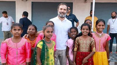 Congress leader Rahul Gandhi with children the party’s Bharat Jodo Yatra in Telangana. (ANI )