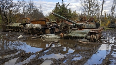 Russian tanks damaged in recent fighting are seen near the recently retaken village of Kamianka, Kharkiv region, Ukraine, Sunday, Oct. 30, 2022. (AP Photo/Efrem Lukatsky) (AP)