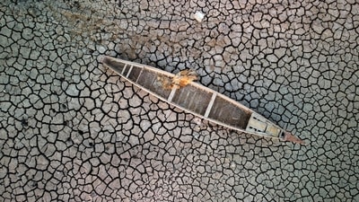 In this file aerial photo taken earlier this year shows a boat on the dried-up bed of a section of Iraq's receding southern marshes of Chibayish in Dhi Qar province. (AFP) In this file aerial photo taken earlier this year shows a boat on the dried-up bed of a section of Iraq's receding southern marshes of Chibayish in Dhi Qar province. (AFP)