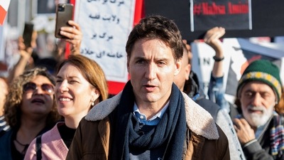 Canada's Prime Minister Justin Trudeau marches during a protest in support of women in Iran. (Reuters)