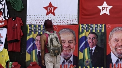 Brazil Election: Merchandise supporting Jair Bolsonaro, Brazil's president, and Luiz Inacio Lula da Silva, Brazil's former president, at a vendor's stand. (Bloomberg)