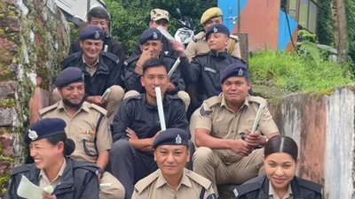 The image, taken from the Twitter video by Nagaland minister Temjen Imna Along, shows cops taking part in ‘try not to laugh’ challenge. (Screengrab)