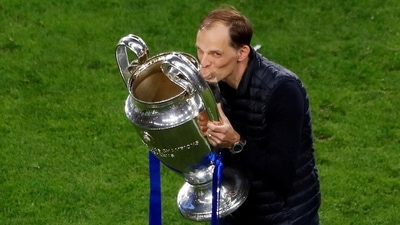 Thomas Tuchel celebrates with the trophy after winning the Champions League. (Pool via REUTERS)