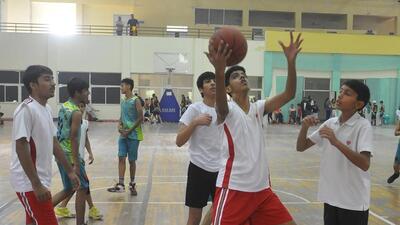 Players in action during 8th Bhagwant Singh Memorial Basketball Tournament at Mohali Stadium. (Ravi Kumar/HT)