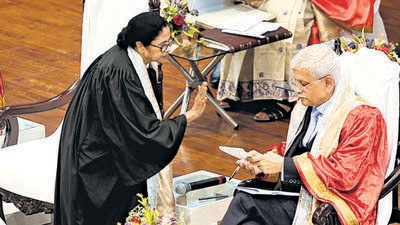 Kolkata, Oct 30 (ANI): West Bengal Chief Minister Mamata Banerjee interacts with Chief Justice of India (CJI) Justice UU Lalit at the 14 Convocation ceremony of the West Bengal National University of Juridical Sciences, as Calcutta High Court Chief Justice Prakash Srivastava looks on, in Kolkata on Sunday. (ANI Photo) (Utpal Sarkar) Kolkata, Oct 30 (ANI): West Bengal Chief Minister Mamata Banerjee interacts with Chief Justice of India (CJI) Justice UU Lalit at the 14 Convocation ceremony of the West Bengal National University of Juridical Sciences, as Calcutta High Court Chief Justice Prakash Srivastava looks on, in Kolkata on Sunday. (ANI Photo) (Utpal Sarkar)