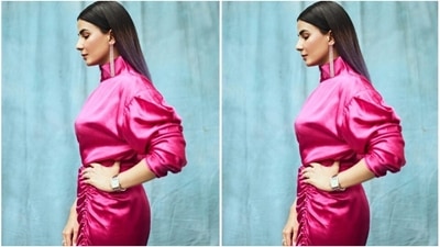 Kirti decked up in a pink long satin dress with turtle neck details and quarter sleeves. It also featured gathered up details below the waist and one thigh high slit. (Instagram/@iamkirtikulhari) Kirti decked up in a pink long satin dress with turtle neck details and quarter sleeves. It also featured gathered up details below the waist and one thigh high slit. (Instagram/@iamkirtikulhari)