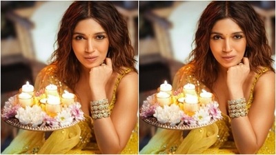 Playing muse to fashion designer house Pernia's Pop-Up Shop, Bhumi picked a bright yellow lehenga with silver mirrorwork and sequin details throughout. (Instagram/@bhumipednekar) Playing muse to fashion designer house Pernia's Pop-Up Shop, Bhumi picked a bright yellow lehenga with silver mirrorwork and sequin details throughout. (Instagram/@bhumipednekar)
