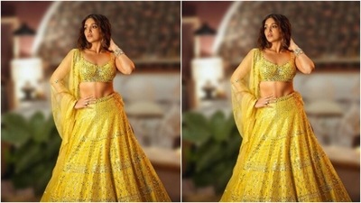 In statement golden earrings from Pernia's Pop-Up Shop, and golden bangles from the shelves of Azotiique, Bhumi looked ethereal. (Instagram/@bhumipednekar) In statement golden earrings from Pernia's Pop-Up Shop, and golden bangles from the shelves of Azotiique, Bhumi looked ethereal. (Instagram/@bhumipednekar)