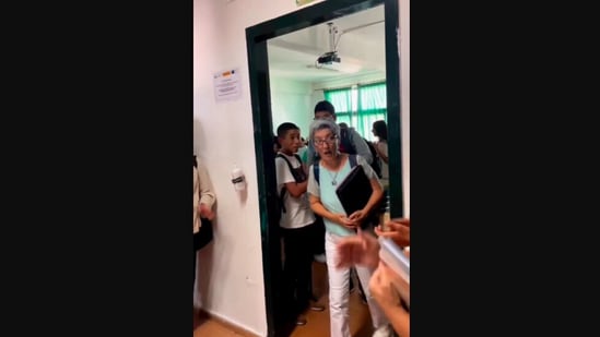 The image, taken from the Instagram video, shows the students clapping for their teacher retiring after 30 years.(Instagram/@goodnews_movement)