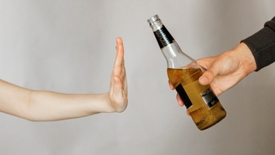 Alcohol impacts the mood and causes depression. It is advised to quit alcohol as soon as possible. (Unsplash)