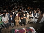 People pray during a funeral ceremony for a female journalist in Lahore, Pakistan. People pray during a funeral ceremony for a female journalist in Lahore, Pakistan.