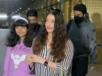 Aishwarya Rai, Abhishek Bachchan and Aaradhya at Mumbai airport. (Varinder Chawla) Aishwarya Rai, Abhishek Bachchan and Aaradhya at Mumbai airport. (Varinder Chawla)