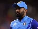 Dinesh Karthik walked off the ground clutching his lower back