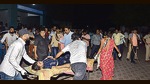 Local residents help shift an injured person to GMERS General Hospital in Morbi district on Sunday. (PTI) Local residents help shift an injured person to GMERS General Hospital in Morbi district on Sunday. (PTI)