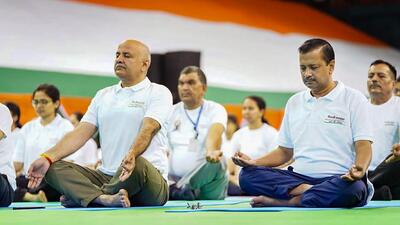 Delhi chief minister Arvind Kejriwal and deputy CM Manish Sisodia and others perform yoga at Thyagaraj Stadium. (Representative image/PTI) Delhi chief minister Arvind Kejriwal and deputy CM Manish Sisodia and others perform yoga at Thyagaraj Stadium. (Representative image/PTI)