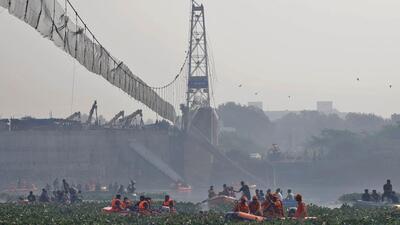 Rescuers search for survivors after a suspension bridge collapsed in Morbi town in Gujarat on Sunday. (REUTERS) Rescuers search for survivors after a suspension bridge collapsed in Morbi town in Gujarat on Sunday. (REUTERS)