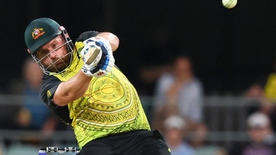 Aaron Finch hits a boundary during the T20 World Cup cricket match between Australia and Ireland, in Brisbane. (AP) Aaron Finch hits a boundary during the T20 World Cup cricket match between Australia and Ireland, in Brisbane. (AP)