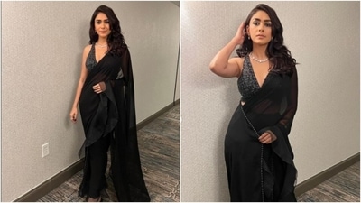 Mrunal Thakur’s black saree is the perfect Halloween attire with an ethnic twist (Instagram/@mrunalthakur) Mrunal Thakur’s black saree is the perfect Halloween attire with an ethnic twist (Instagram/@mrunalthakur)