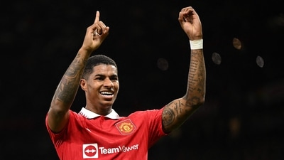 Marcus Rashford indicates it's his 100th Manchester United (AFP)