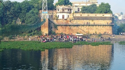 The 232-meter (761-foot)-long bridge had been closed for repairs for almost six months and had reopened just four days earlier for the Gujarati New Year. (AFP) The 232-meter (761-foot)-long bridge had been closed for repairs for almost six months and had reopened just four days earlier for the Gujarati New Year. (AFP)