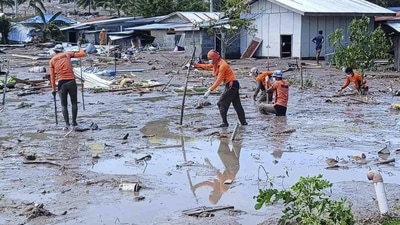 Philippines Nalgae Storm: Rescuers continue their search for missing bodies at Barangay Kusiong, Datu Odin Sinsuat, Maguindanao province. (AP) Philippines Nalgae Storm: Rescuers continue their search for missing bodies at Barangay Kusiong, Datu Odin Sinsuat, Maguindanao province. (AP)